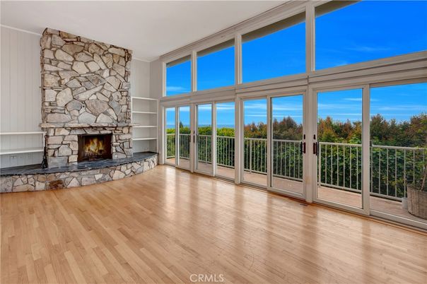 Fireplace, Interior, Sun Room, Wood Texture Flooring