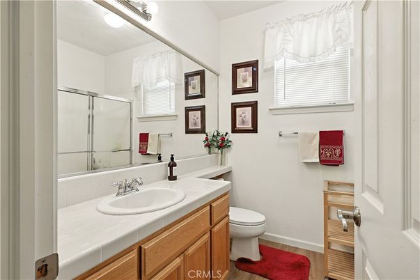 Bathroom, Glass Shower, Interior, Tile Countertops, Wood Texture Flooring