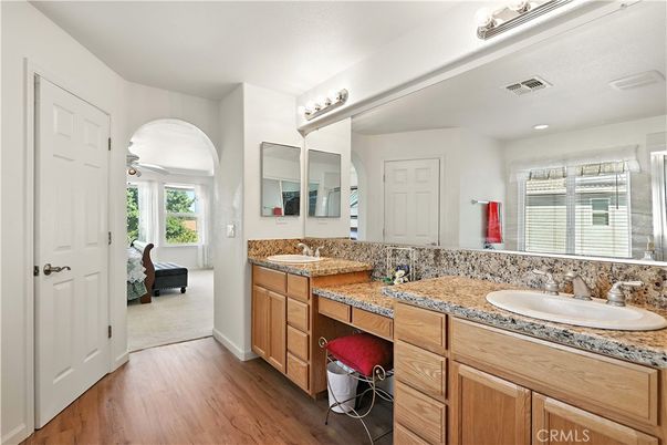 Bathroom, Dual Sink Vanities, Interior, Recessed Lighting, Wood Texture Flooring