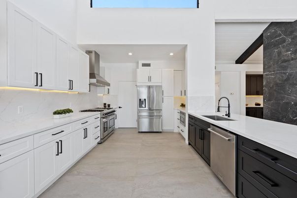 Interior, Kitchen, Marble Walls, Recessed Lighting, Stainless Steel Appliances