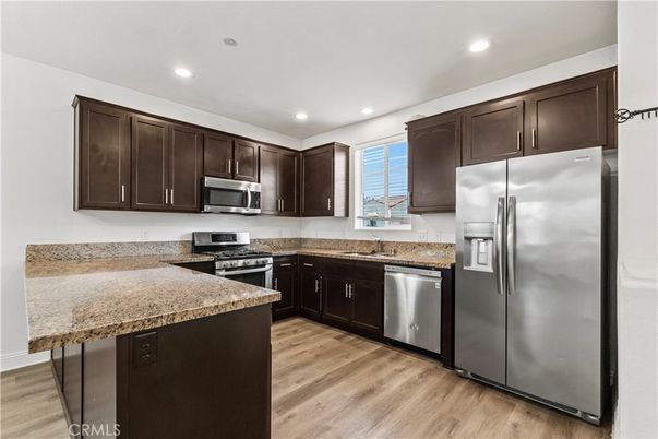 Interior, Kitchen, Recessed Lighting, Stainless Steel Appliances, Wood Texture Flooring