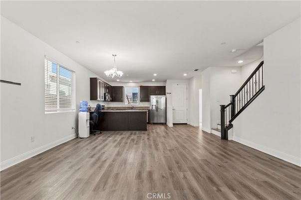 Chandelier, Interior, Kitchen, Recessed Lighting, Stainless Steel Appliances, Wood Texture Flooring