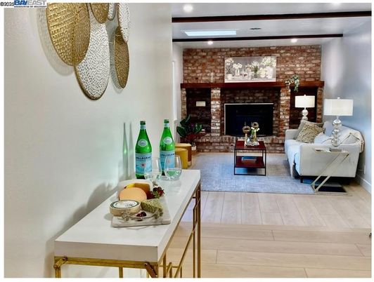 Fireplace, Interior, Living room, Recessed Lighting, Stone Walls, Wood Texture Flooring