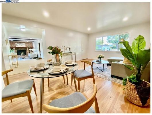 Dining room, Fireplace, Interior, Living room, Recessed Lighting, Wood Texture Flooring