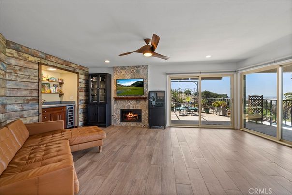 Fireplace, Interior, Recessed Lighting, Stone Walls, Wood Texture Flooring