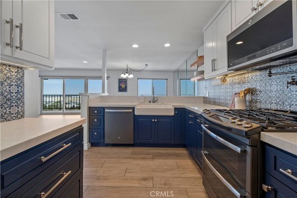 Chandelier, Interior, Kitchen, Recessed Lighting, Stainless Steel Appliances, Wood Texture Flooring