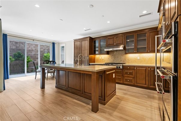 Dining room, Interior, Kitchen, Recessed Lighting, Stainless Steel Appliances, Wood Texture Flooring