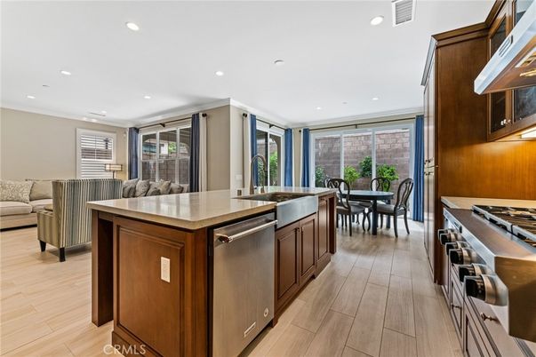 Dining room, Interior, Kitchen, Recessed Lighting, Stainless Steel Appliances, Wood Texture Flooring