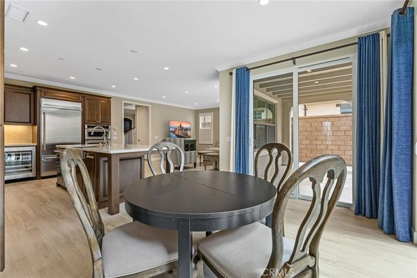Dining room, Interior, Kitchen, Recessed Lighting, Stainless Steel Appliances, Wood Texture Flooring