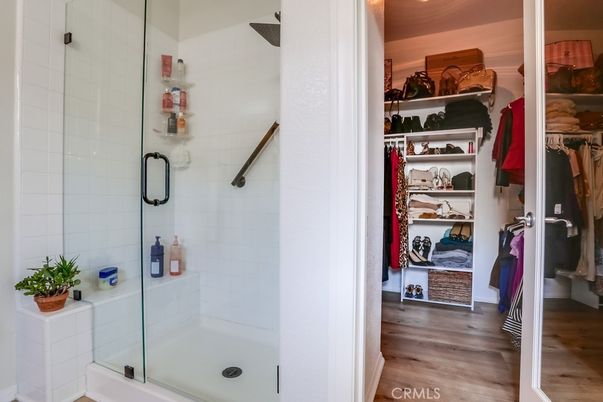 Bathroom, Glass Shower, Interior, Recessed Lighting, Walk-in Closets, Wood Texture Flooring