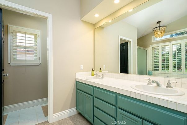 Bathroom, Dual Sink Vanities, Interior, Recessed Lighting, Tile Countertops