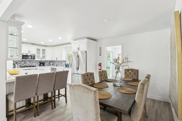 Dining room, Interior, Kitchen, Recessed Lighting, Stainless Steel Appliances, Wood Texture Flooring
