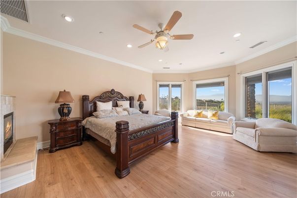 Bedroom, Fireplace, Interior, Recessed Lighting, Wood Texture Flooring