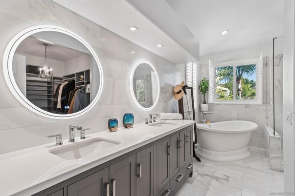 Bathroom, Chandelier, Dual Sink Vanities, Free Standing Baths, Interior, Marble, Pendant Lights, Recessed Lighting