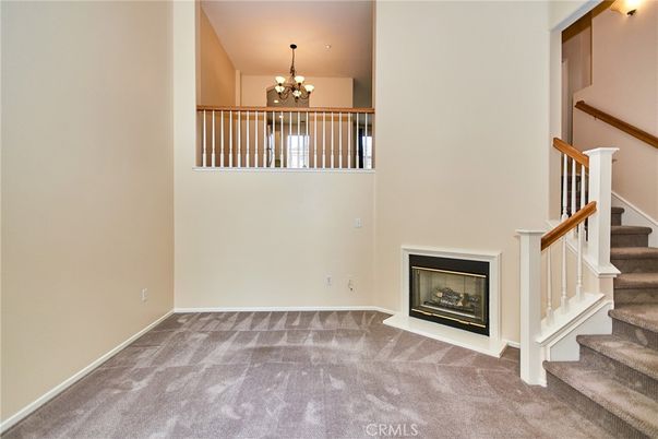 Chandelier, Empty room, Fireplace, Interior