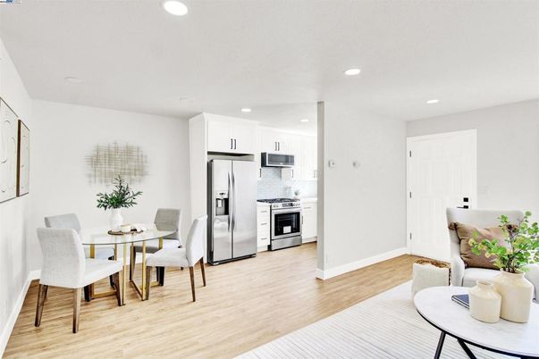 Dining room, Interior, Kitchen, Recessed Lighting, Stainless Steel Appliances, Wood Texture Flooring