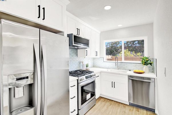 Interior, Kitchen, Recessed Lighting, Stainless Steel Appliances, Wood Texture Flooring