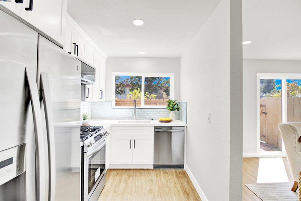 Interior, Kitchen, Recessed Lighting, Stainless Steel Appliances, Wood Texture Flooring