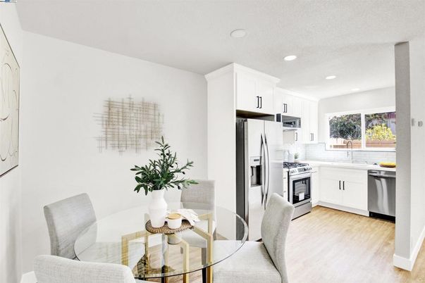 Dining room, Interior, Kitchen, Recessed Lighting, Stainless Steel Appliances, Wood Texture Flooring