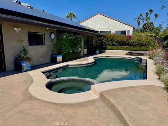 Exterior, Pool, Solar Panels