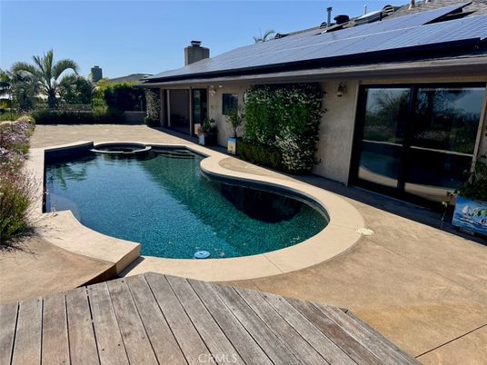 Exterior, Pool, Solar Panels