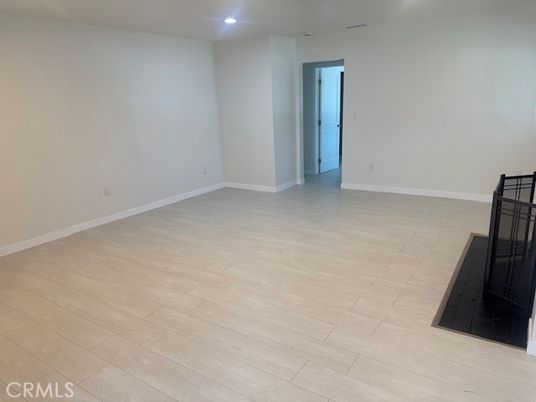 Empty room, Fireplace, Interior, Recessed Lighting, Wood Texture Flooring