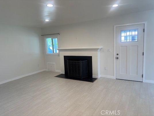 Empty room, Fireplace, Interior, Recessed Lighting, Wood Texture Flooring