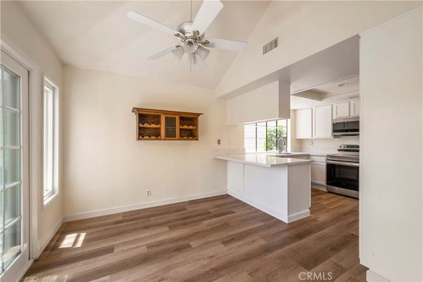 Empty room, Interior, Kitchen, Stainless Steel Appliances, Wood Texture Flooring
