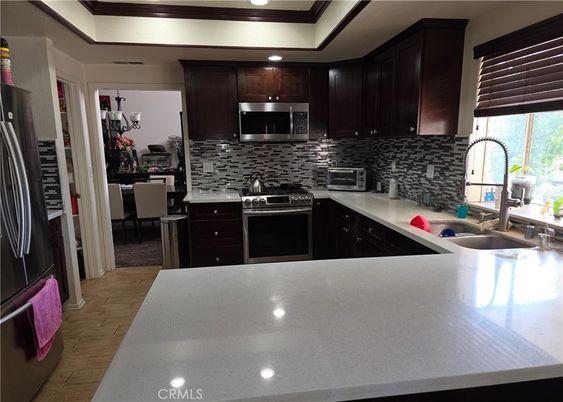 Dining room, Interior, Kitchen, Recessed Lighting, Stainless Steel Appliances, Wood Texture Flooring