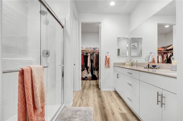 Bathroom, Glass Shower, Interior, Recessed Lighting, Walk-in Closets, Wood Texture Flooring