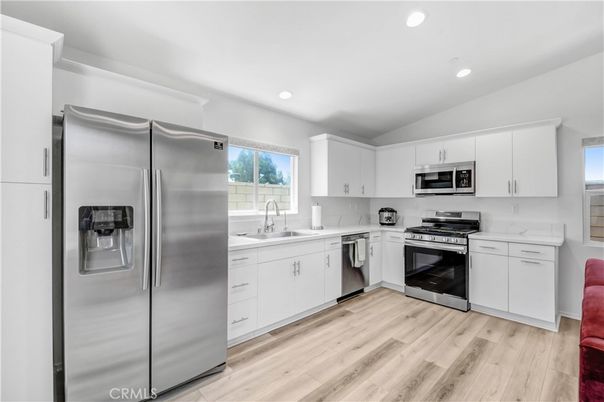 Interior, Kitchen, Recessed Lighting, Stainless Steel Appliances, Wood Texture Flooring