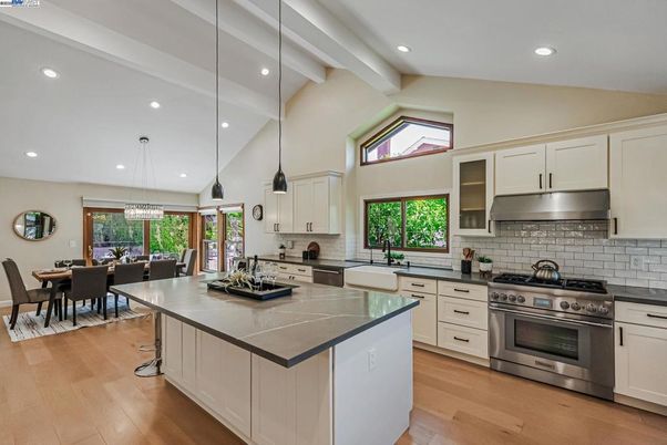 Dining room, Interior, Kitchen, Pendant Lights, Recessed Lighting, Stainless Steel Appliances, Wood Texture Flooring