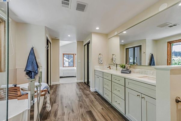 Bathroom, Bedroom, Dual Sink Vanities, Interior, Recessed Lighting, Wood Texture Flooring