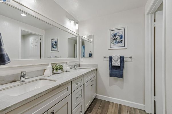 Bathroom, Dual Sink Vanities, Interior, Recessed Lighting, Wood Texture Flooring