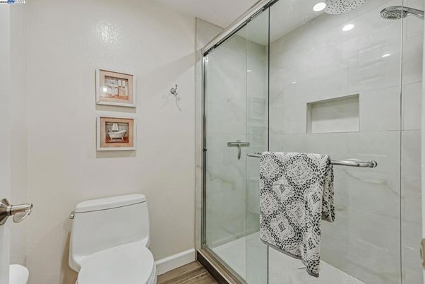 Bathroom, Glass Shower, Interior, Recessed Lighting, Wood Texture Flooring