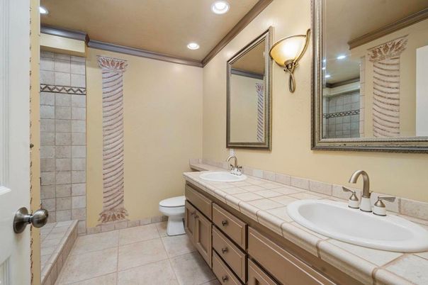 Bathroom, Dual Sink Vanities, Interior, Recessed Lighting, Tile Countertops