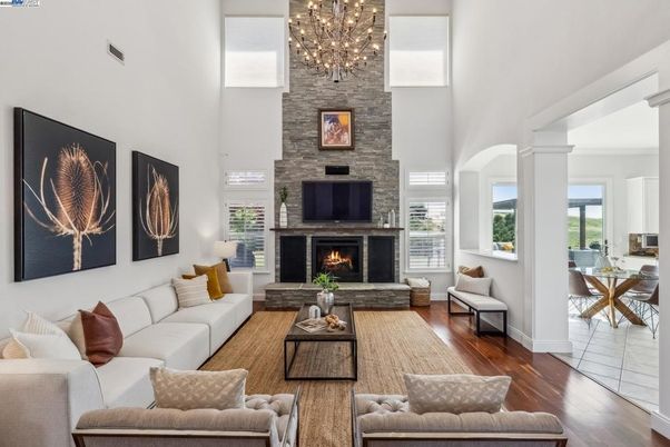 Chandelier, Fireplace, Interior, Living room, Pendant Lights, Stone Walls, Wood Texture Flooring