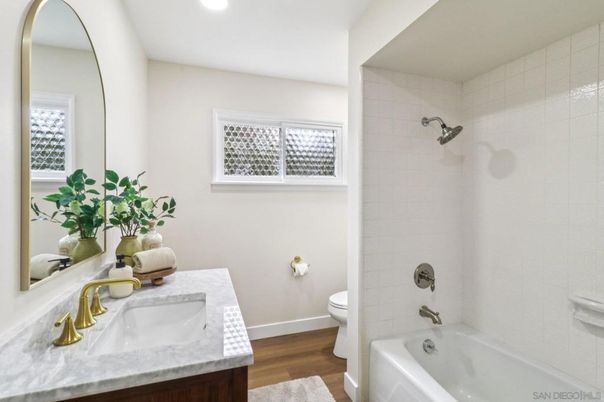 Bathroom, Dual Sink Vanities, Interior, Recessed Lighting, Wood Texture Flooring