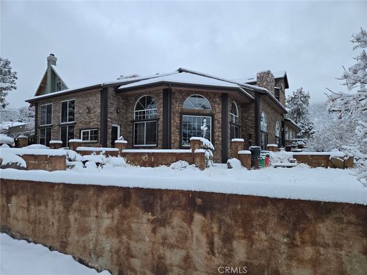Exterior, Facade, Brick Facade, Log Home