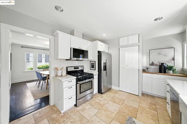 Dining room, Interior, Kitchen, Recessed Lighting, Stainless Steel Appliances, Wood Texture Flooring