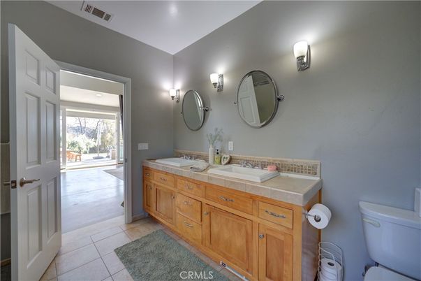 Bathroom, Dual Sink Vanities, Interior, Recessed Lighting, Tile Countertops