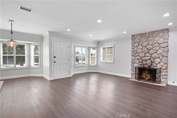 Fireplace, Interior, Pendant Lights, Recessed Lighting, Wood Texture Flooring
