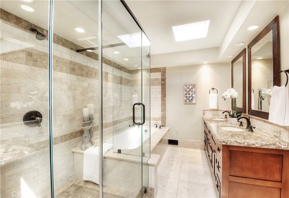Bathroom, Dual Sink Vanities, Glass Shower, Interior, Recessed Lighting, Stone Walls