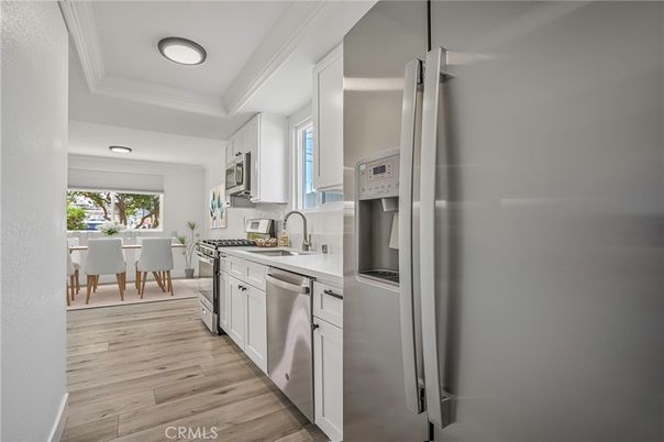 Dining room, Interior, Kitchen, Recessed Lighting, Stainless Steel Appliances, Wood Texture Flooring