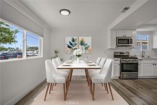 Dining room, Interior, Kitchen, Recessed Lighting, Stainless Steel Appliances, Wood Texture Flooring