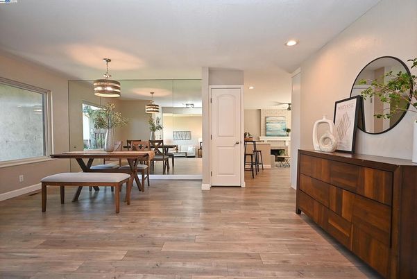 Dining room, Fireplace, Interior, Pendant Lights, Recessed Lighting, Wood Texture Flooring