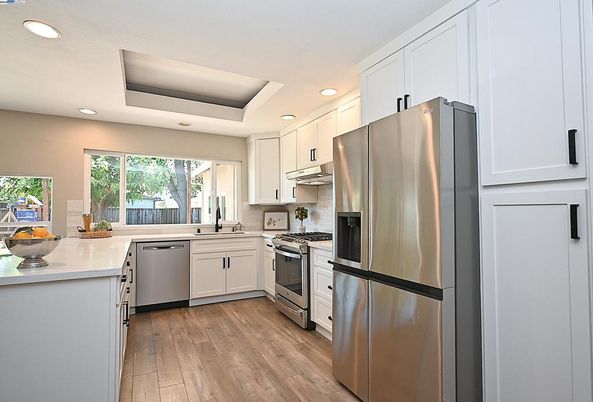 Interior, Kitchen, Recessed Lighting, Stainless Steel Appliances, Wood Texture Flooring