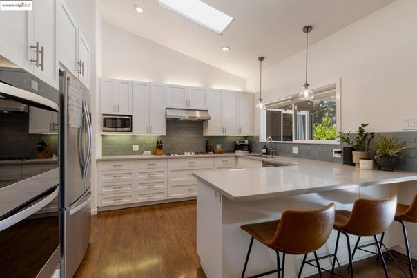 Interior, Kitchen, Pendant Lights, Recessed Lighting, Stainless Steel Appliances, Wood Texture Flooring