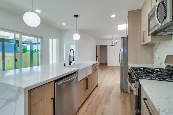 Interior, Kitchen, Pendant Lights, Recessed Lighting, Stainless Steel Appliances, Wood Texture Flooring