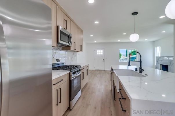 Interior, Kitchen, Pendant Lights, Recessed Lighting, Stainless Steel Appliances, Wood Texture Flooring